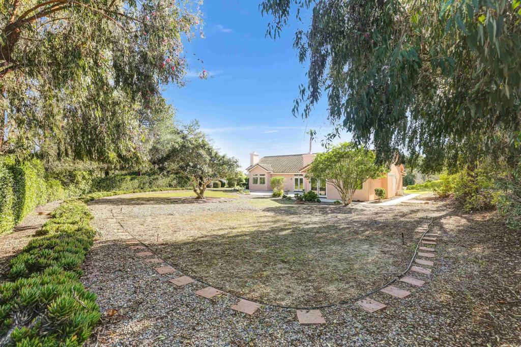 12236 Malabar Drive Poway, CA 92064 - Photo 29 of 32 a view of a yard with plants and trees