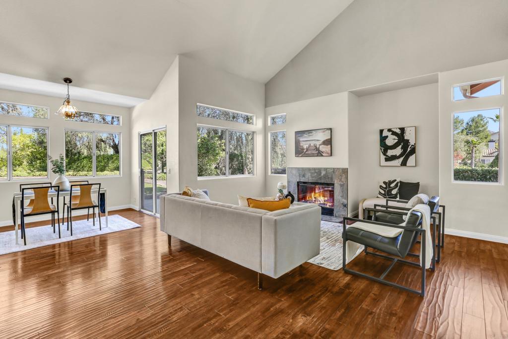 12236 Malabar Drive Poway, CA 92064 - Photo 9 of 32 a living room with fireplace furniture and a wooden floor