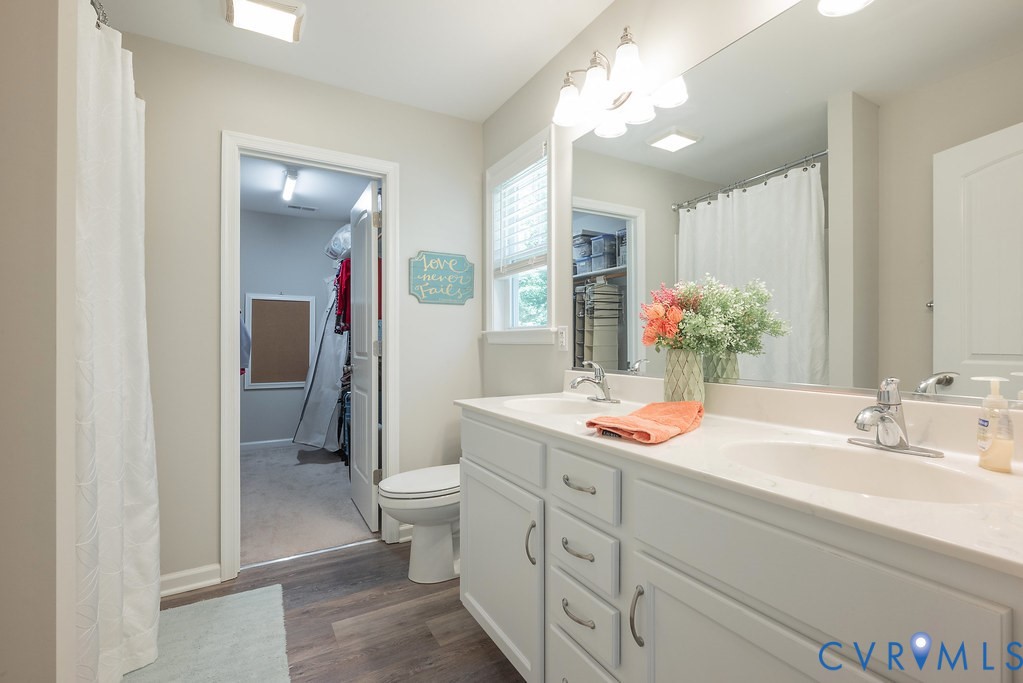 1046 Orchid Road Mineral, VA 23117 - Photo 26 of 50 Primary Bathroom has raised double vanity, tub/sho