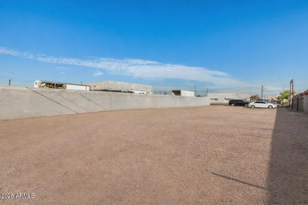 a view of a big yard with an trees