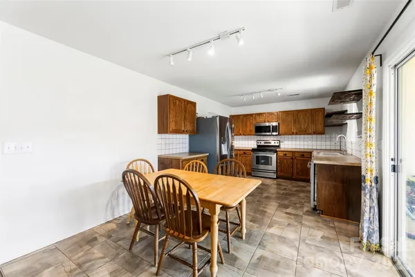 a view of a dining room with furniture