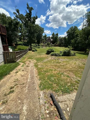 a view of a yard with an outdoor space