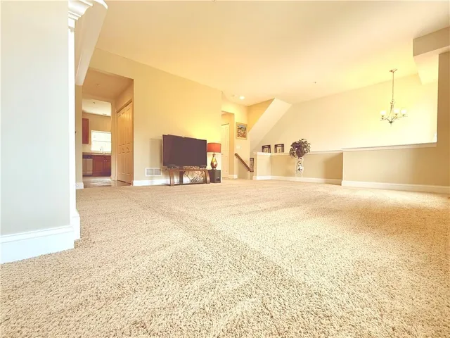 a large bathroom with a large tub and shower