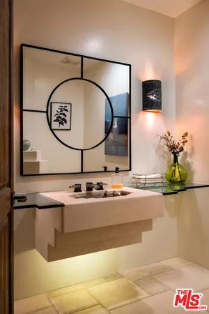 a view of swimming pool with a patio