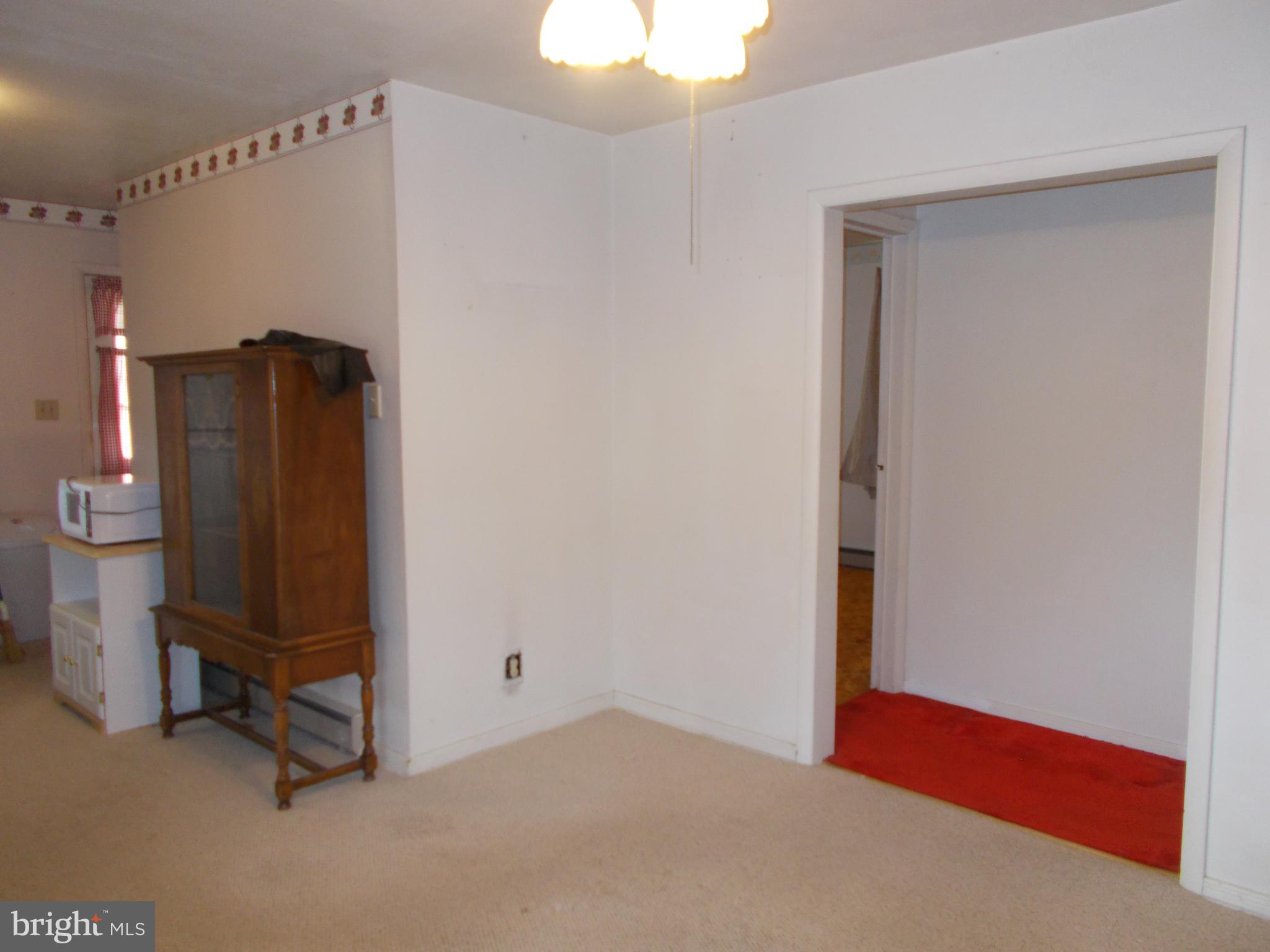 37 Nottingham Road Hagerstown, MD 21740 - Photo 14 of 22 Dining Room into Hallway and Kitchen
