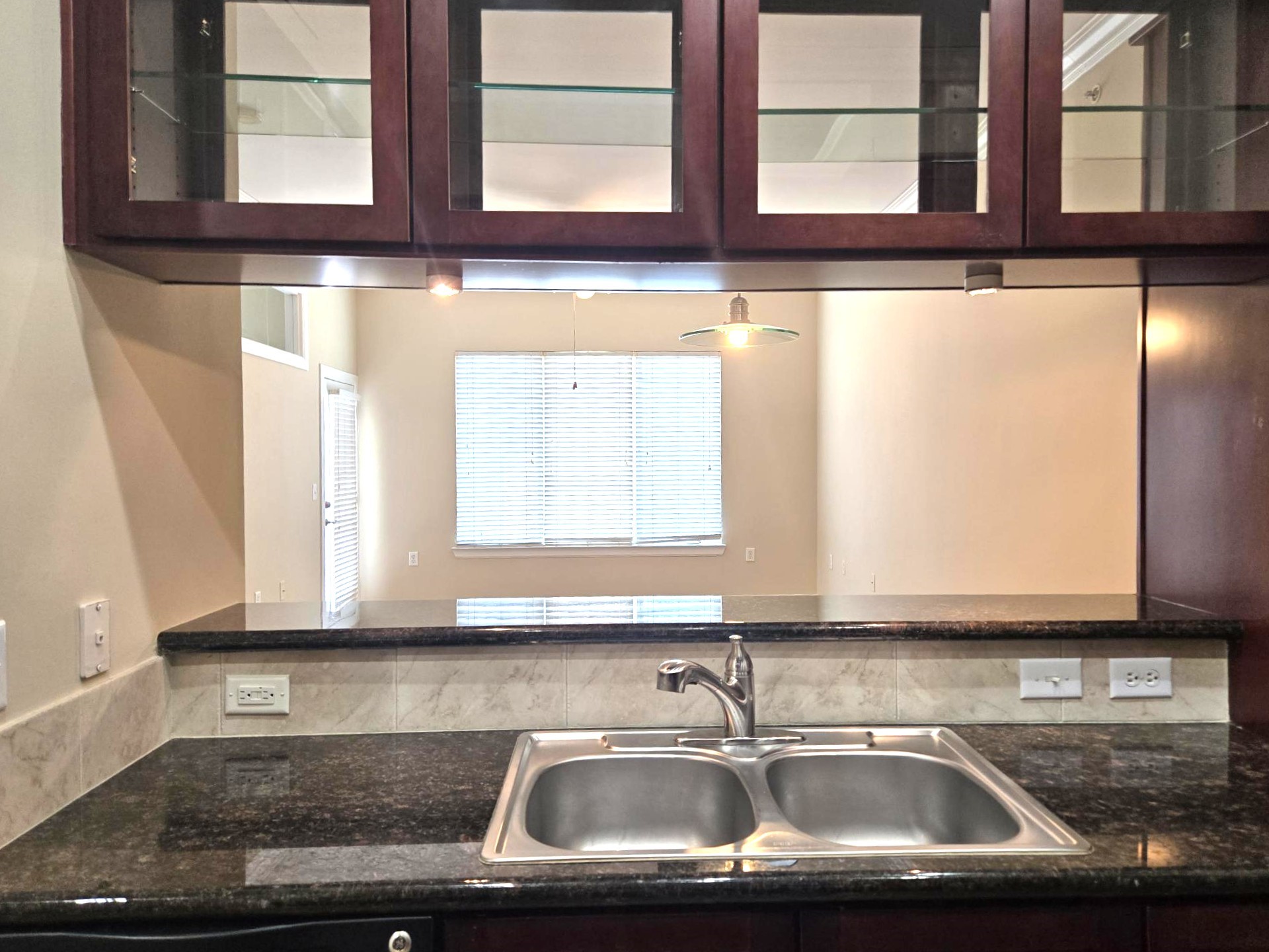 1900 Genesee Street, Unit 207 Houston, TX 77006 - Photo 16 of 50 Pretty backsplash and sleek granite countertops