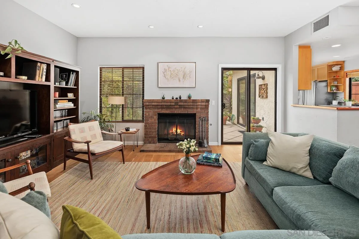 2206 Summerhill Drive Encinitas, CA 92024 - Photo 2 of 33 a living room with furniture and a fireplace