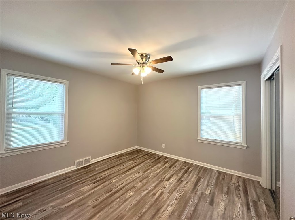 4227 Eastway Road South Euclid, OH 44121 - Photo 10 of 18 Unfurnished room with hardwood / wood-style flooring and ceiling fan