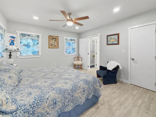 a bed room with a bed and a couch