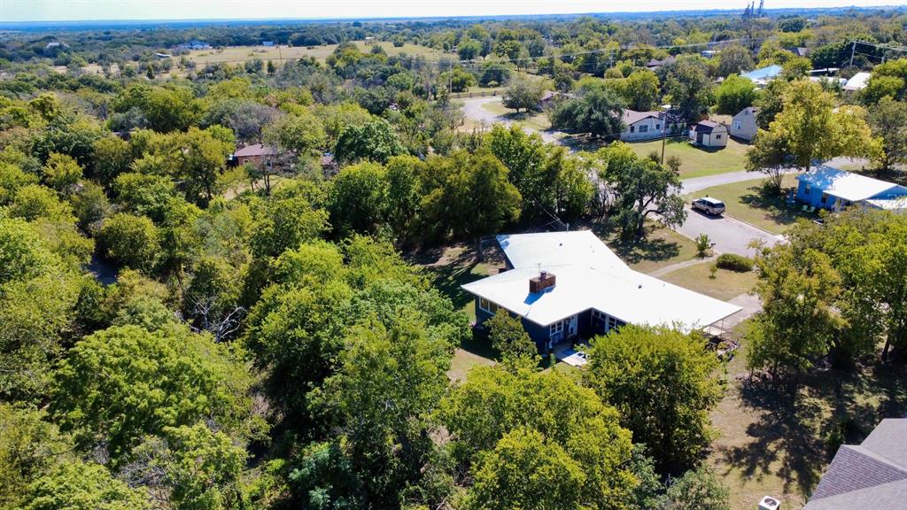625 East Whitney Street Hamilton, TX 76531 - Photo 31 of 36 an aerial view of a house with a yard