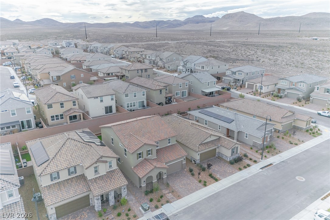 3765 Osiris Avenue Henderson, NV 89044 - Photo 21 of 40 Aerial perspective of suburban area featuring mountains