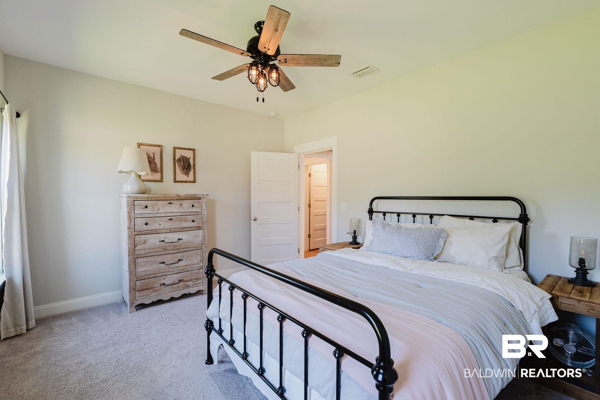 7872 Calverton Street Foley, AL 36535 - Photo 50 of 76 Carpeted room featuring a ceiling fan with light fixture, light-toned walls, and white trim