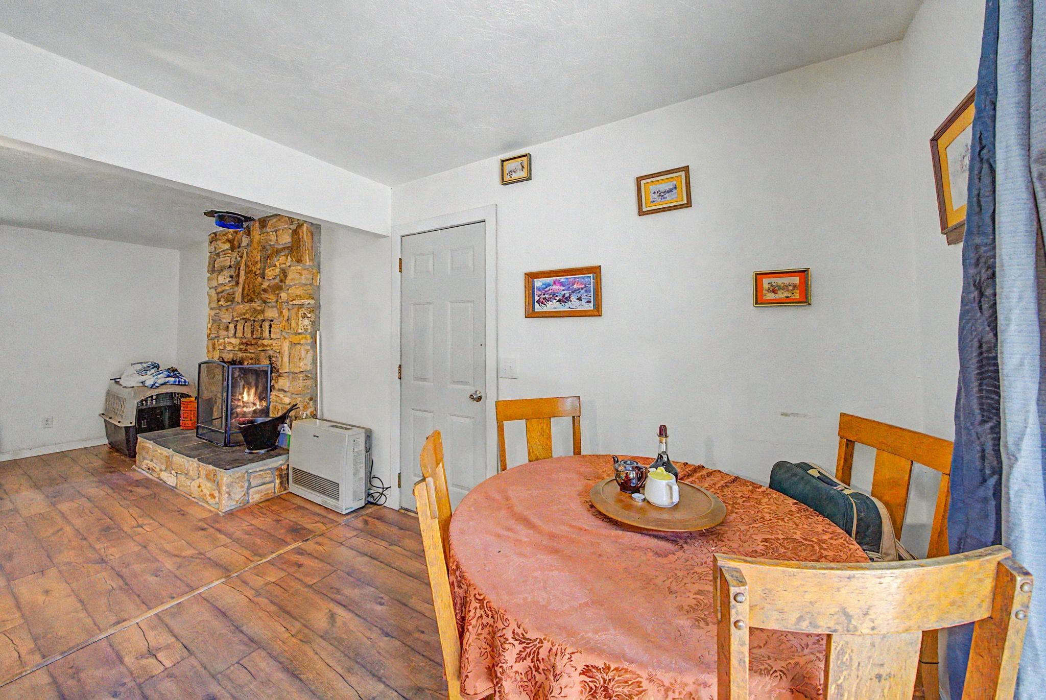 58374 Gill Ranch Road Cromberg, CA 96103 - Photo 23 of 44 a bedroom with furniture and a wooden floor