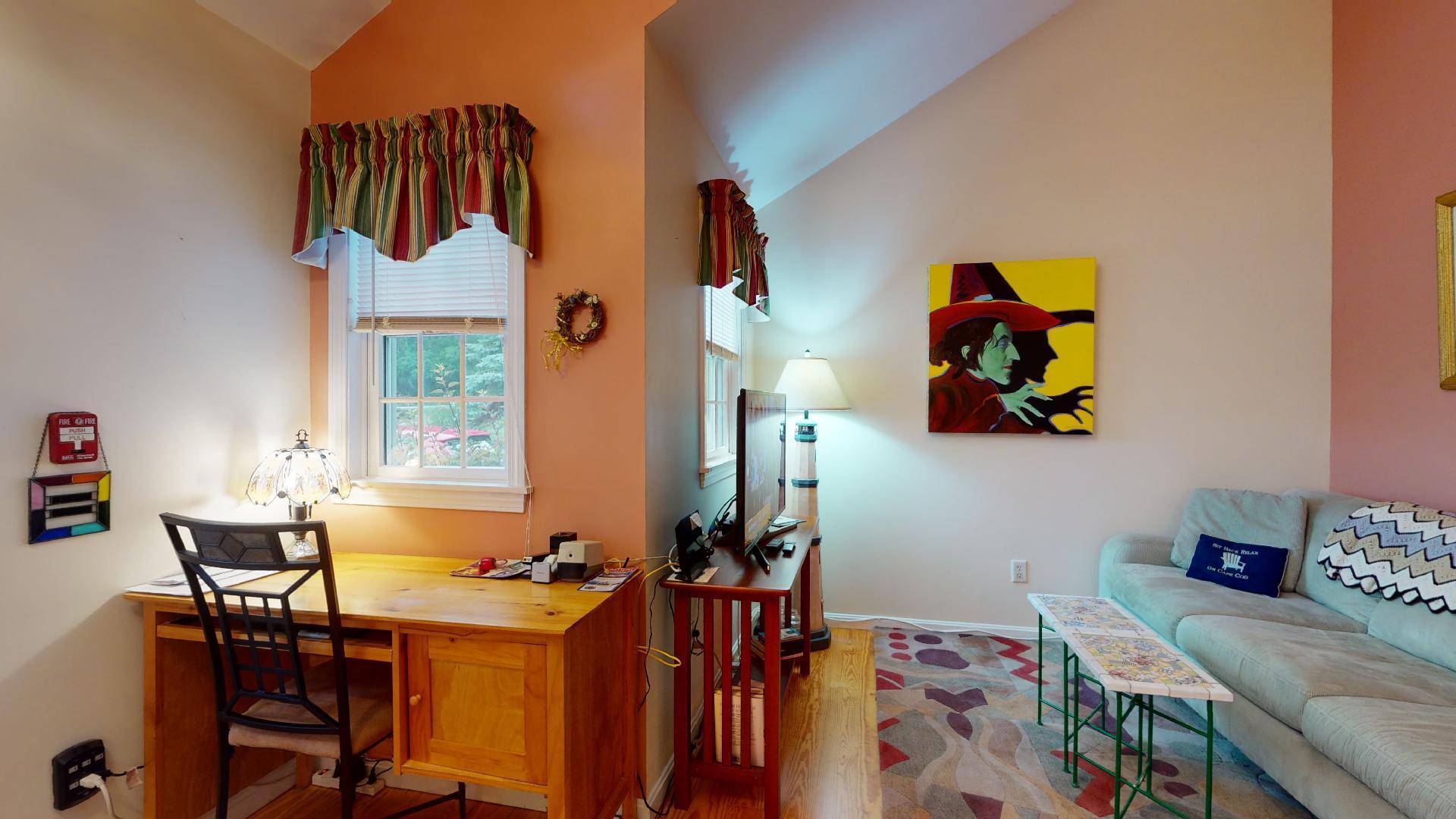 6 Shore Road, Unit 24 Truro, MA 02666 - Photo 3 of 46 a view of a workspace with furniture and a window