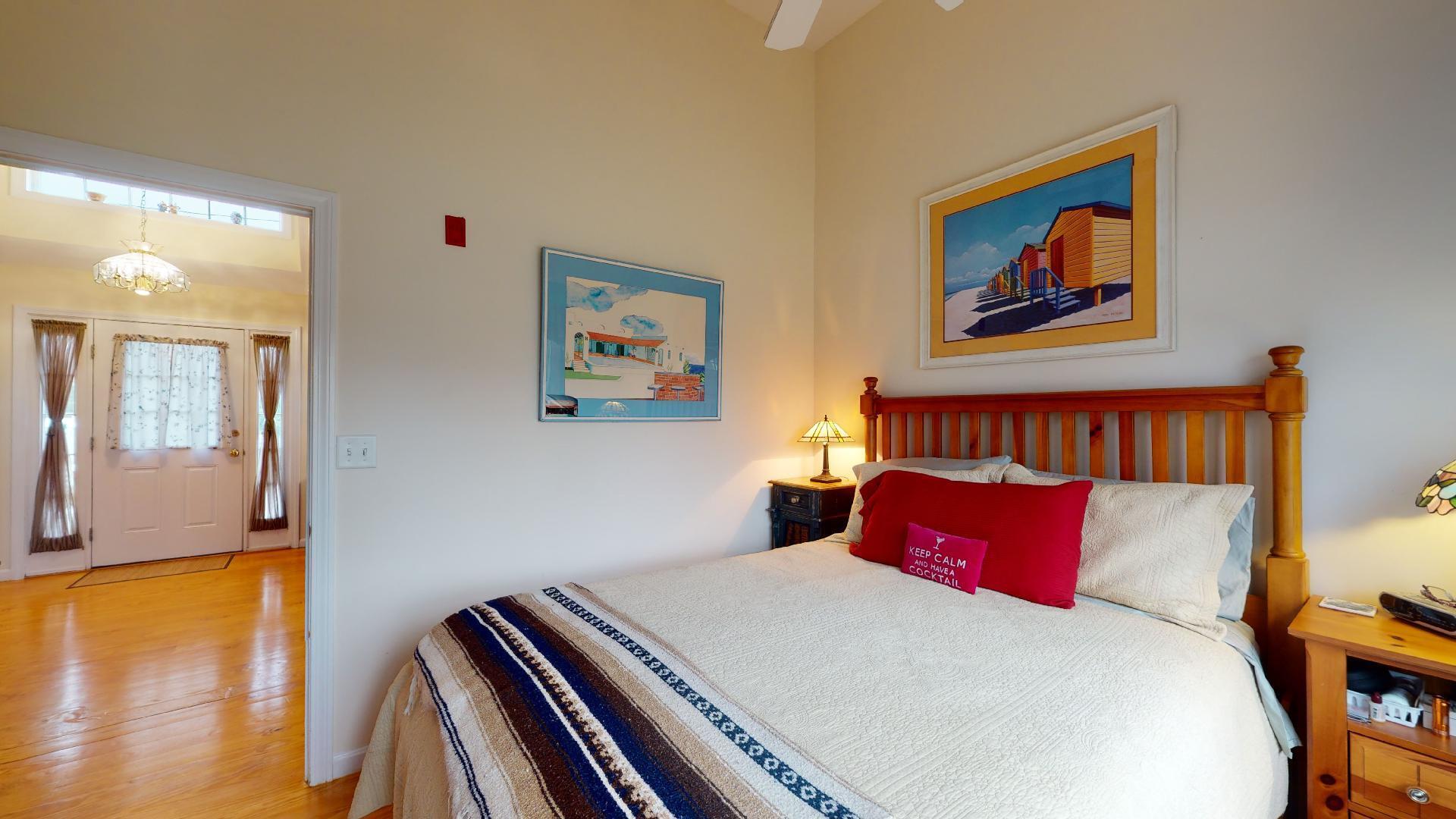 6 Shore Road, Unit 24 Truro, MA 02666 - Photo 37 of 46 a bedroom with bed and wooden floor