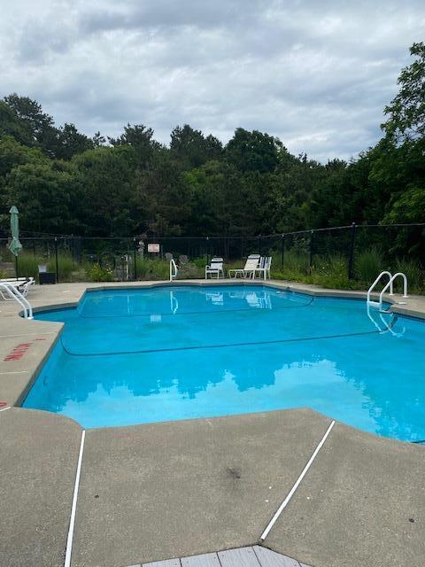 6 Shore Road, Unit 24 Truro, MA 02666 - Photo 43 of 46 a view of a swimming pool with a lake view and mountain view