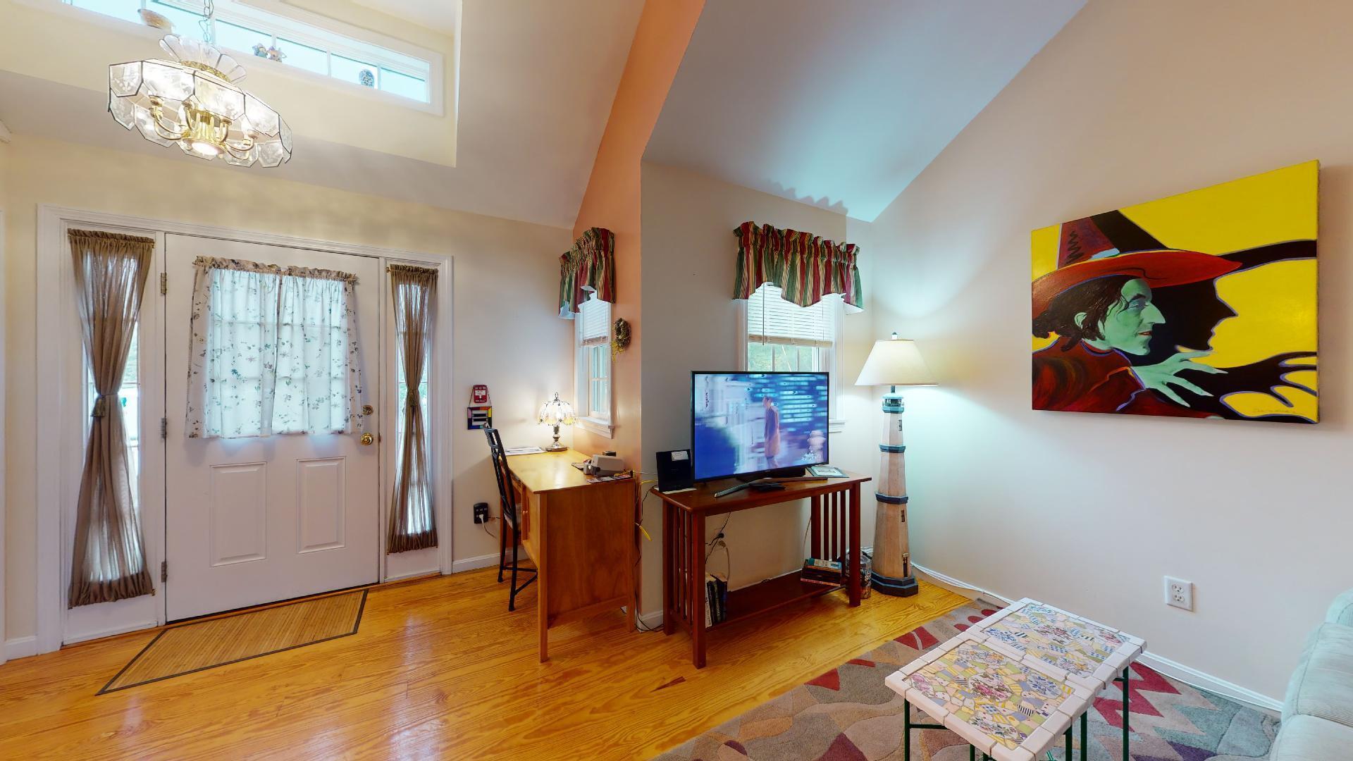 6 Shore Road, Unit 24 Truro, MA 02666 - Photo 10 of 46 a view of a workspace with furniture and a window