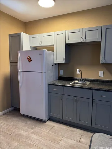 a bathroom with a toilet and a sink