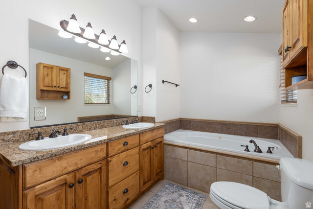 5168 Fairview Loop, Unit C604 Eden, UT 84310 - Photo 24 of 53 Full bathroom featuring double vanity, a garden tub, recessed lighting, and light tile patterned flooring