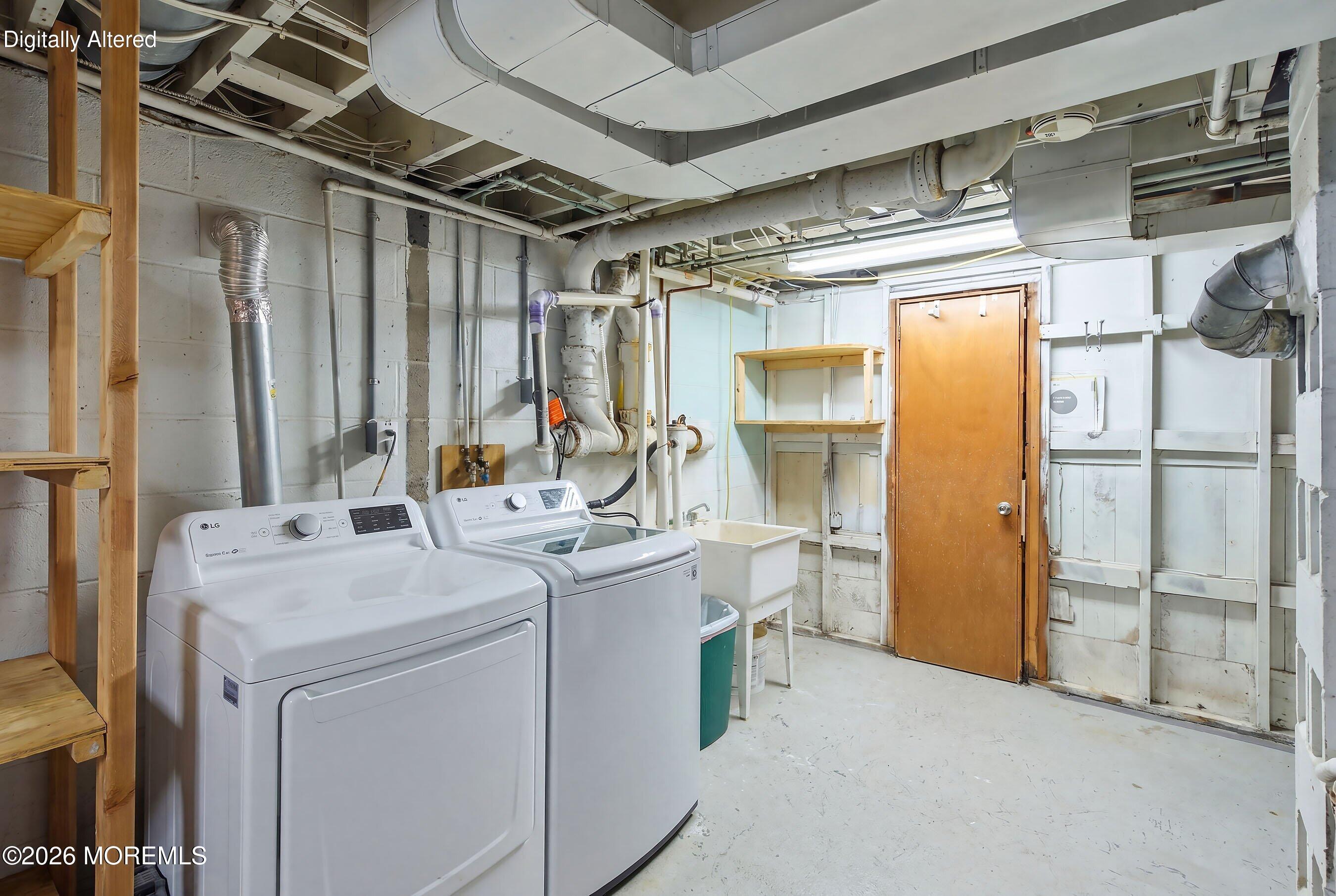 412 Moore Road Neptune Township, NJ 07753 - Photo 27 of 36 a utility room with dryer and washer