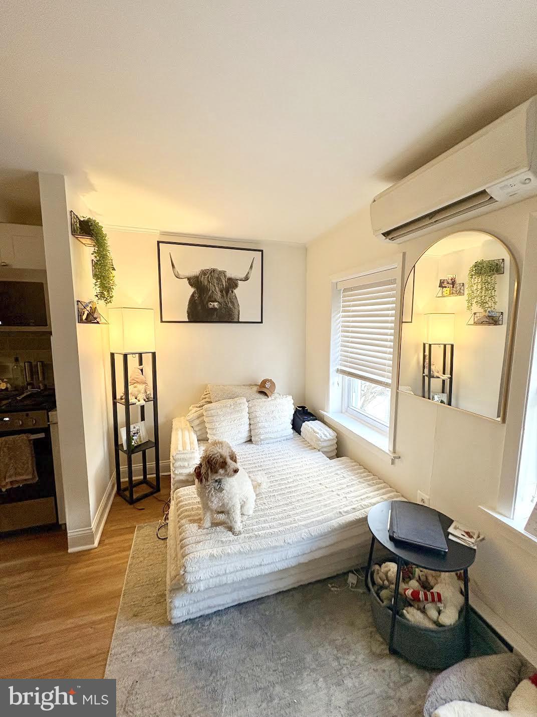 119 1/2 Maple Street, Unit 2 Conshohocken, PA 19428 - Photo 13 of 28 a bedroom with bed and a window