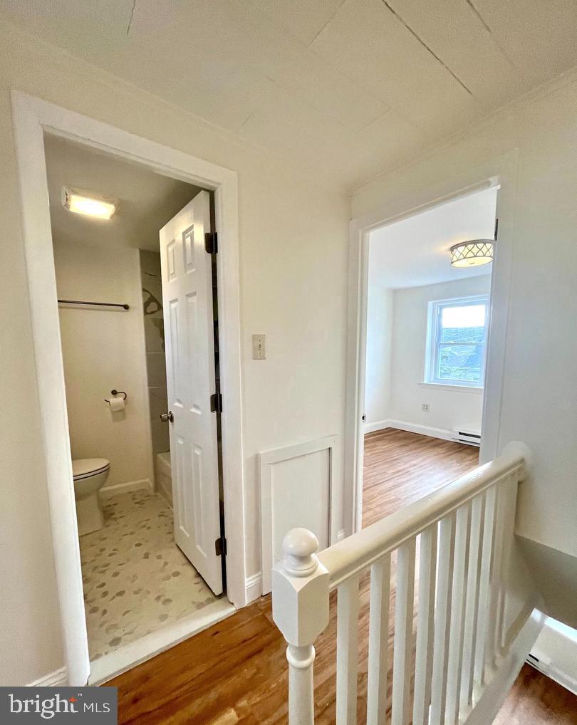 119 1/2 Maple Street, Unit 2 Conshohocken, PA 19428 - Photo 15 of 28 a view of a bathroom from a hallway