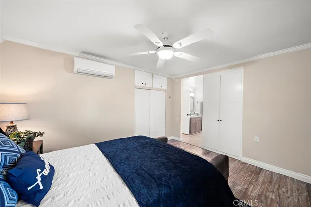 a bathroom with a sink a mirror and a shower