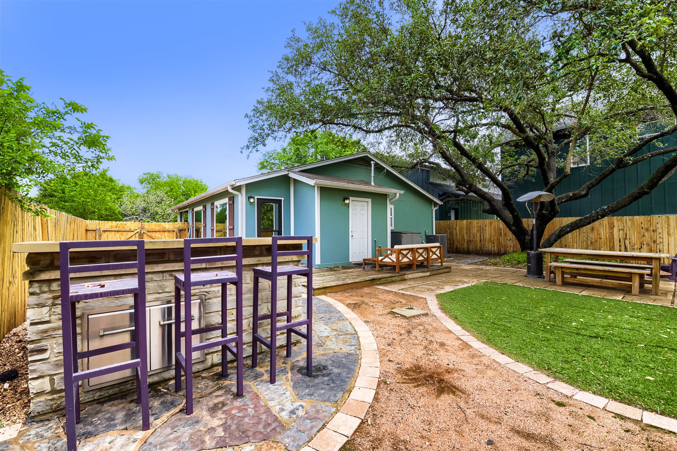 6105 Palm Circle Austin, TX 78741 - Photo 25 of 29 a view of a house with backyard and sitting area