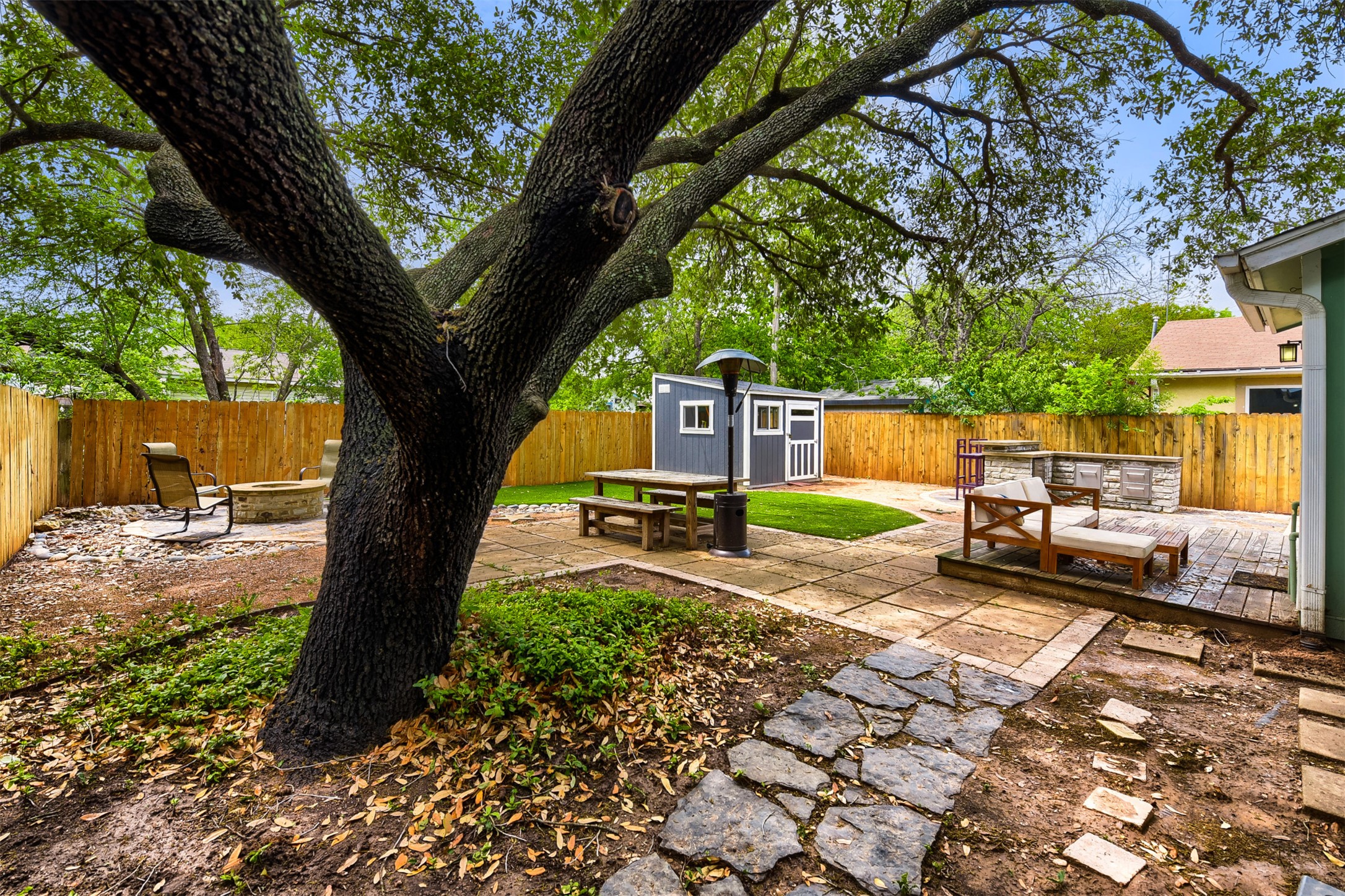 6105 Palm Circle Austin, TX 78741 - Photo 28 of 29 a view of a backyard with a sink and a fire pit