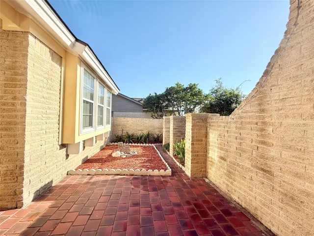 a view of a backyard with a garden