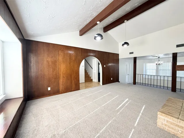 a view of a livingroom with a staircase