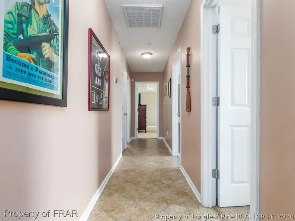 a view of hallway with stairs