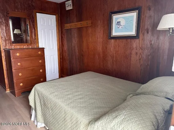 a view of a dining room with furniture and window