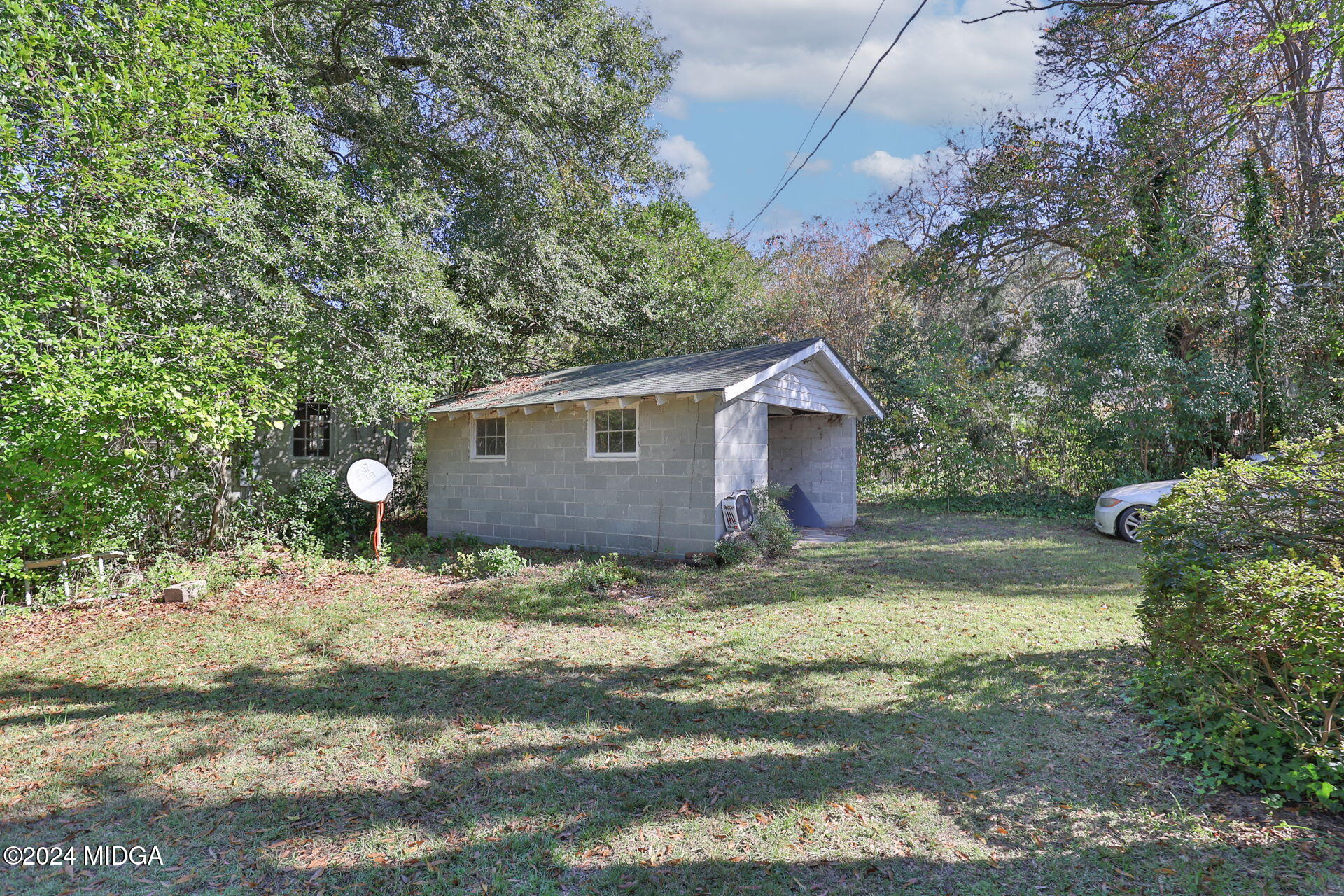 100 Minor Avenue Montezuma, GA 31063 - Photo 5 of 19 a view of a house with a yard