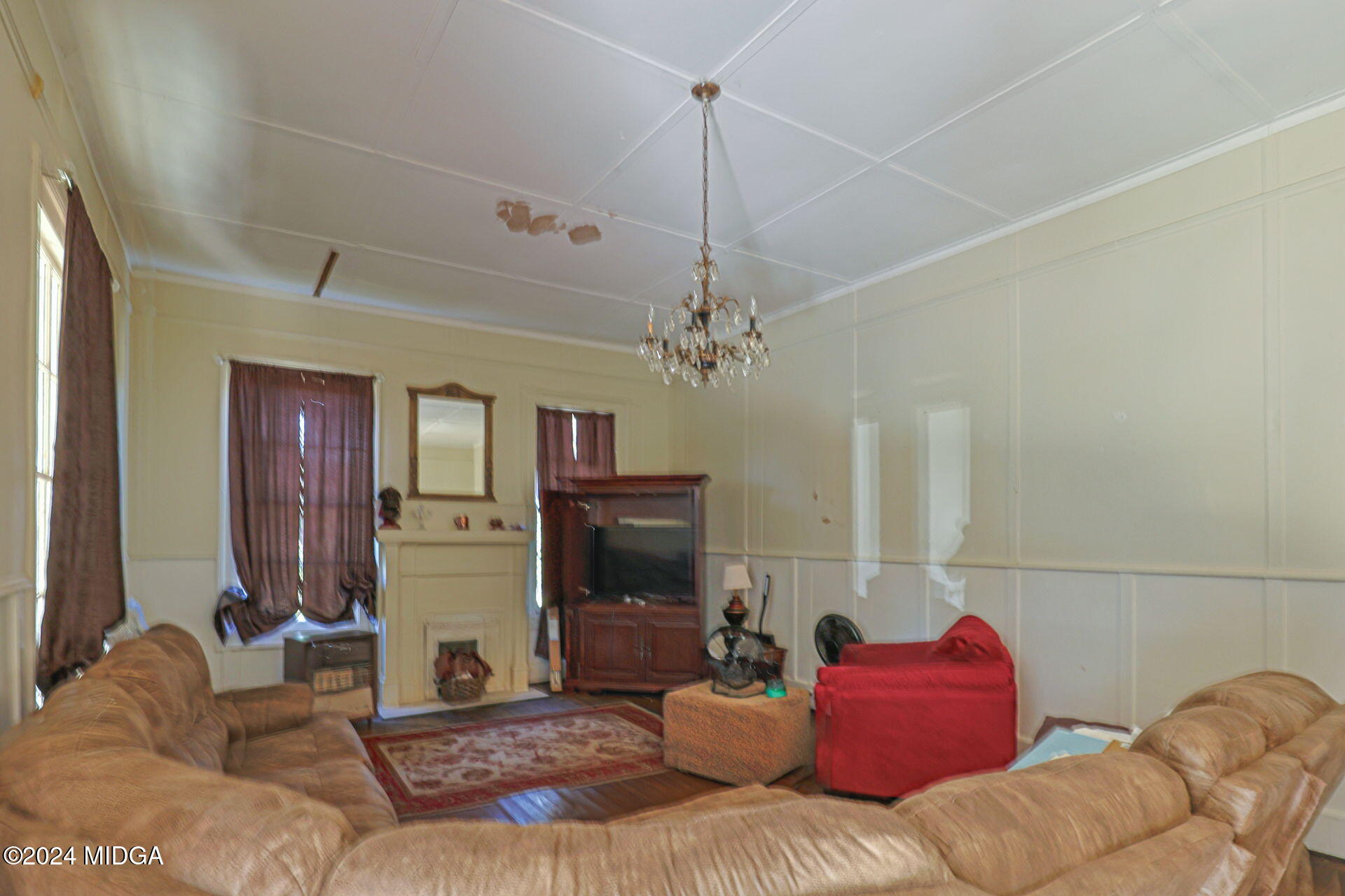 100 Minor Avenue Montezuma, GA 31063 - Photo 8 of 19 a living room with furniture and a fireplace