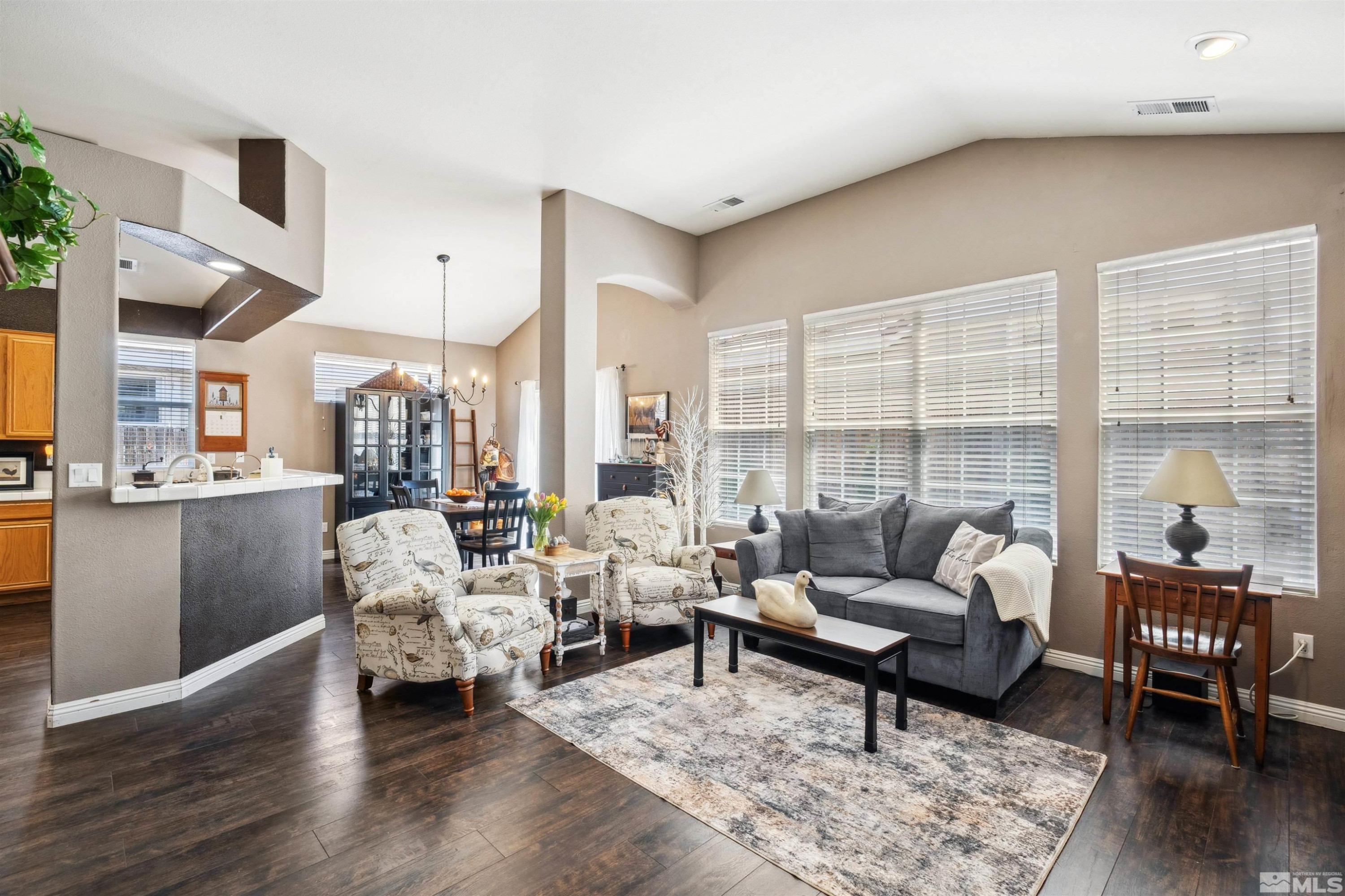 1236 Tule Drive Reno, NV 89521 - Photo 1 of 31 a living room with furniture and a large window
