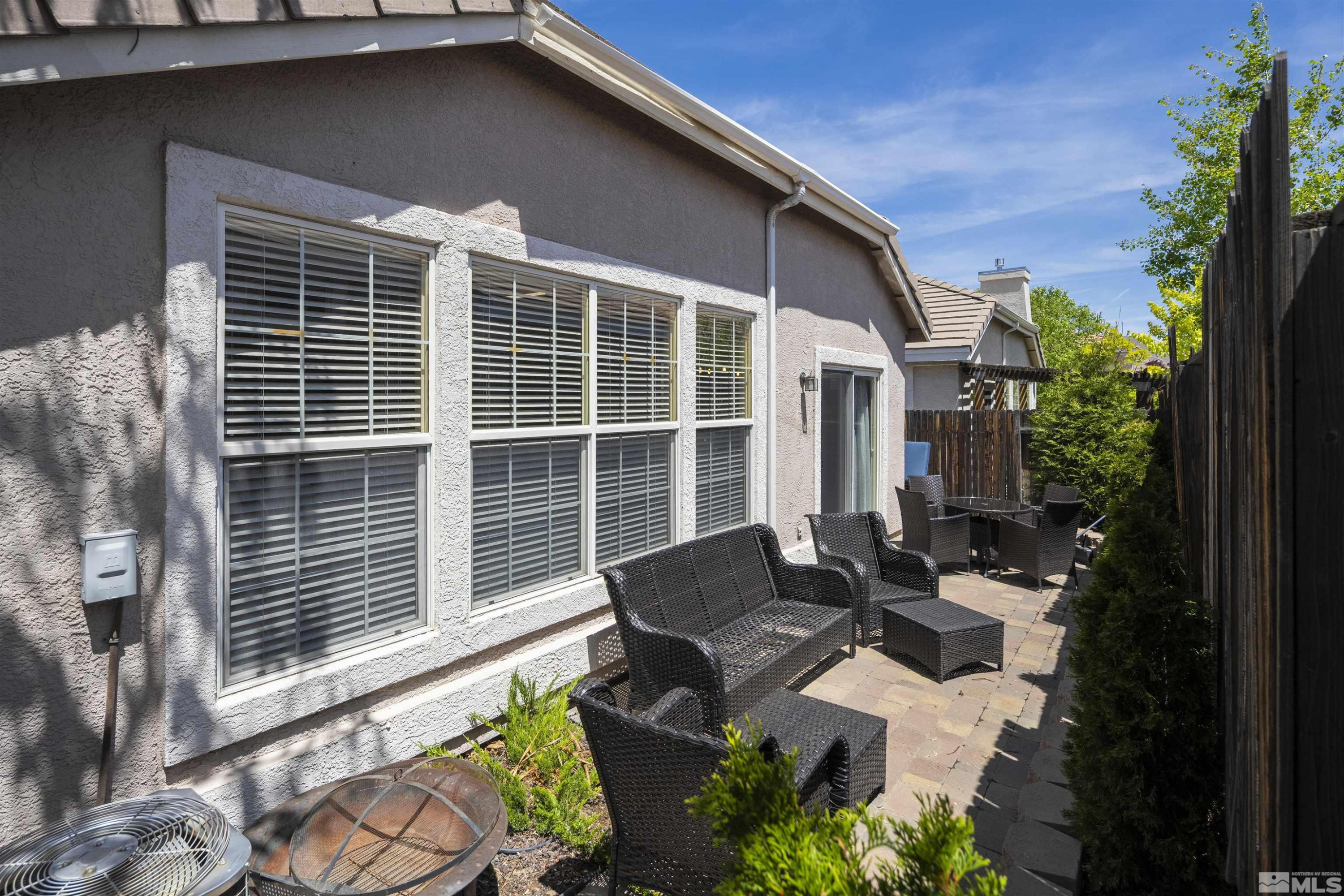 1236 Tule Drive Reno, NV 89521 - Photo 22 of 31 a front view of a house with garden