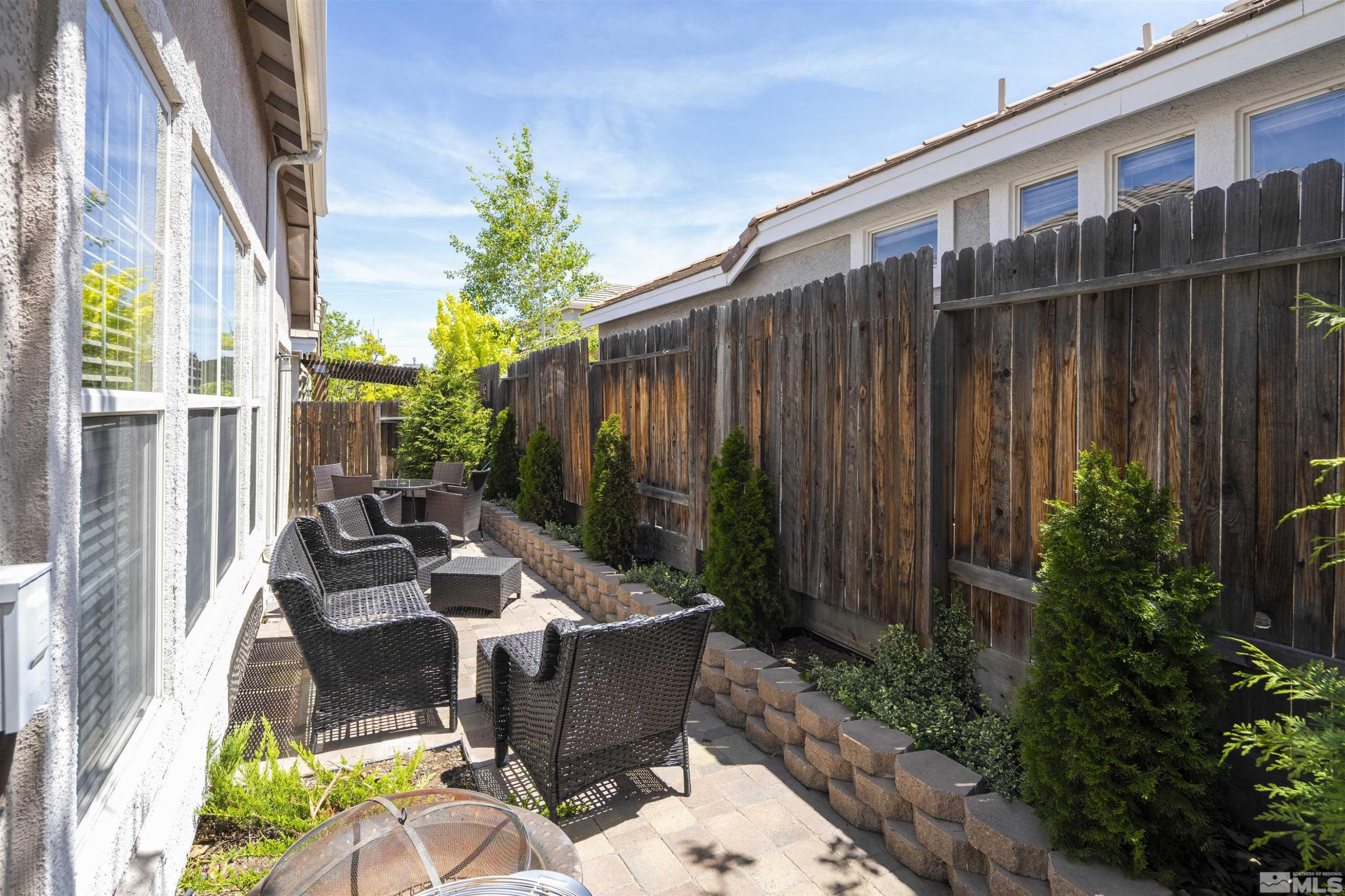 1236 Tule Drive Reno, NV 89521 - Photo 23 of 31 a view of backyard with outdoor seating and plants