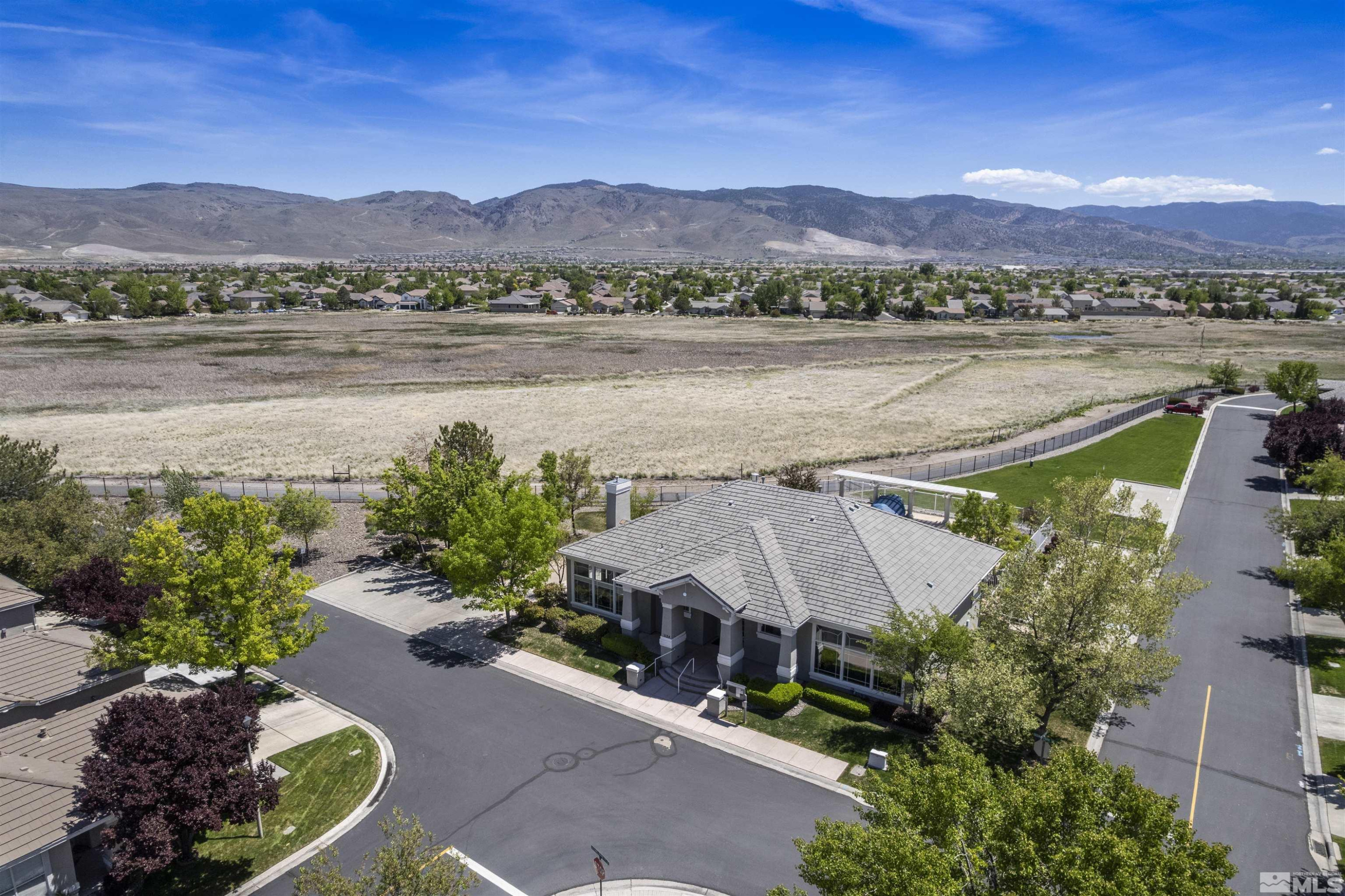1236 Tule Drive Reno, NV 89521 - Photo 31 of 31 a view of a lake with a mountain in the background