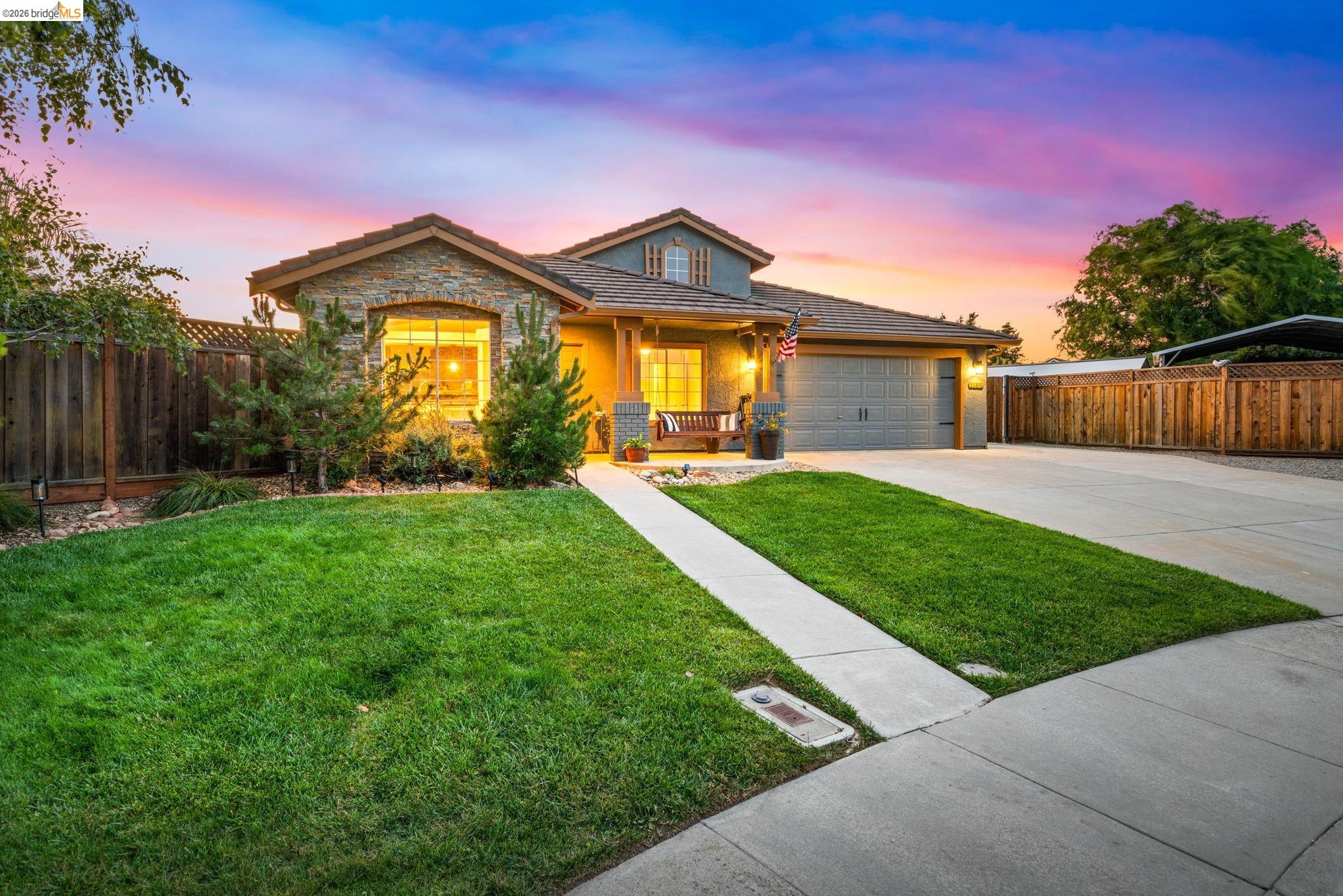 1186 El Rio Court Livermore, CA 94551 - Photo 1 of 60 Stone and siding exterior with an attached garage and expansive driveway