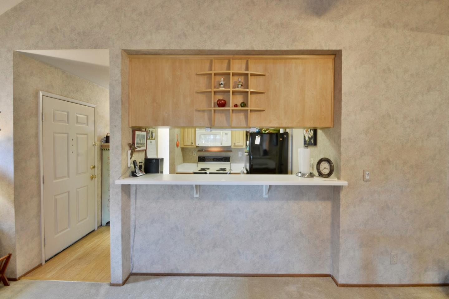738 Natalie Drive Morgan Hill, CA 95037 - Photo 11 of 37 view of kitchen with stainless steel appliances cabinets and empty table
