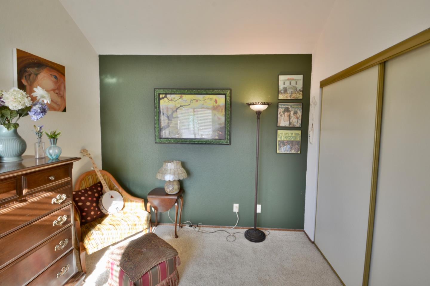 738 Natalie Drive Morgan Hill, CA 95037 - Photo 13 of 37 a bedroom with a bed and wooden floor