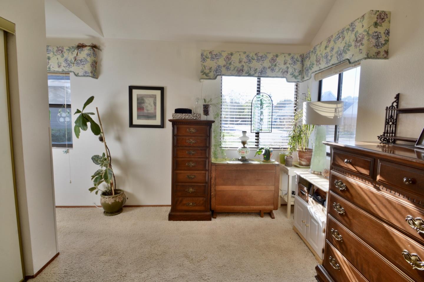 738 Natalie Drive Morgan Hill, CA 95037 - Photo 15 of 37 a bedroom with a bed and a window