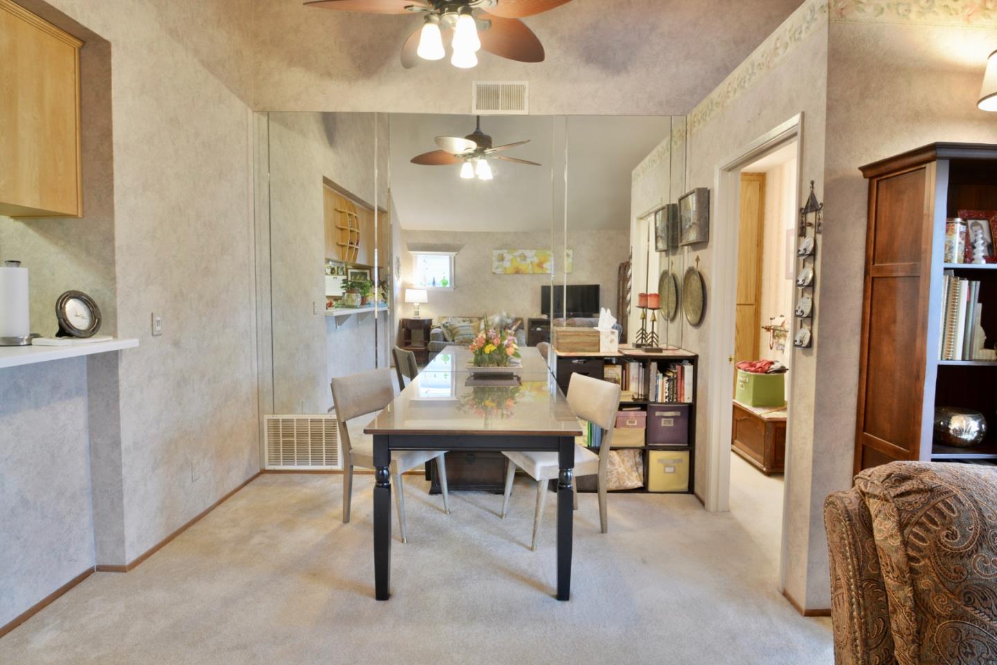 738 Natalie Drive Morgan Hill, CA 95037 - Photo 20 of 37 a view of a livingroom with furniture and a table