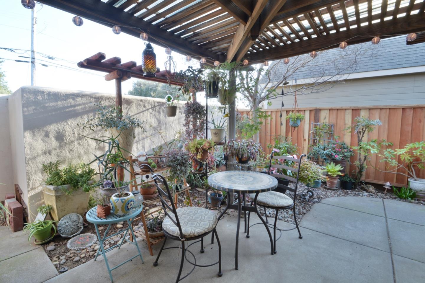 738 Natalie Drive Morgan Hill, CA 95037 - Photo 28 of 37 a view of a chairs and table in a patio