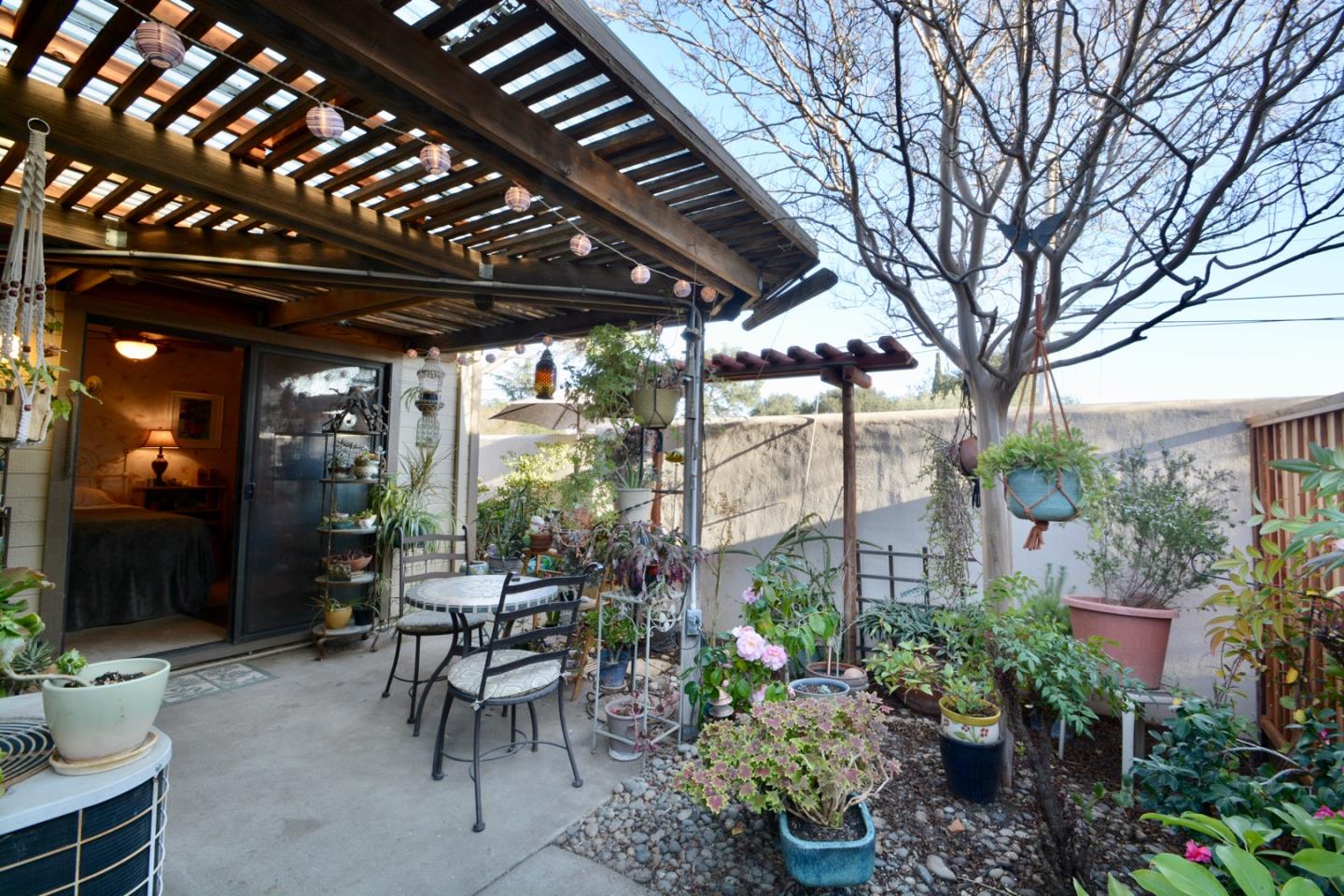 738 Natalie Drive Morgan Hill, CA 95037 - Photo 30 of 37 a view of a patio filled with furniture and a potted plants