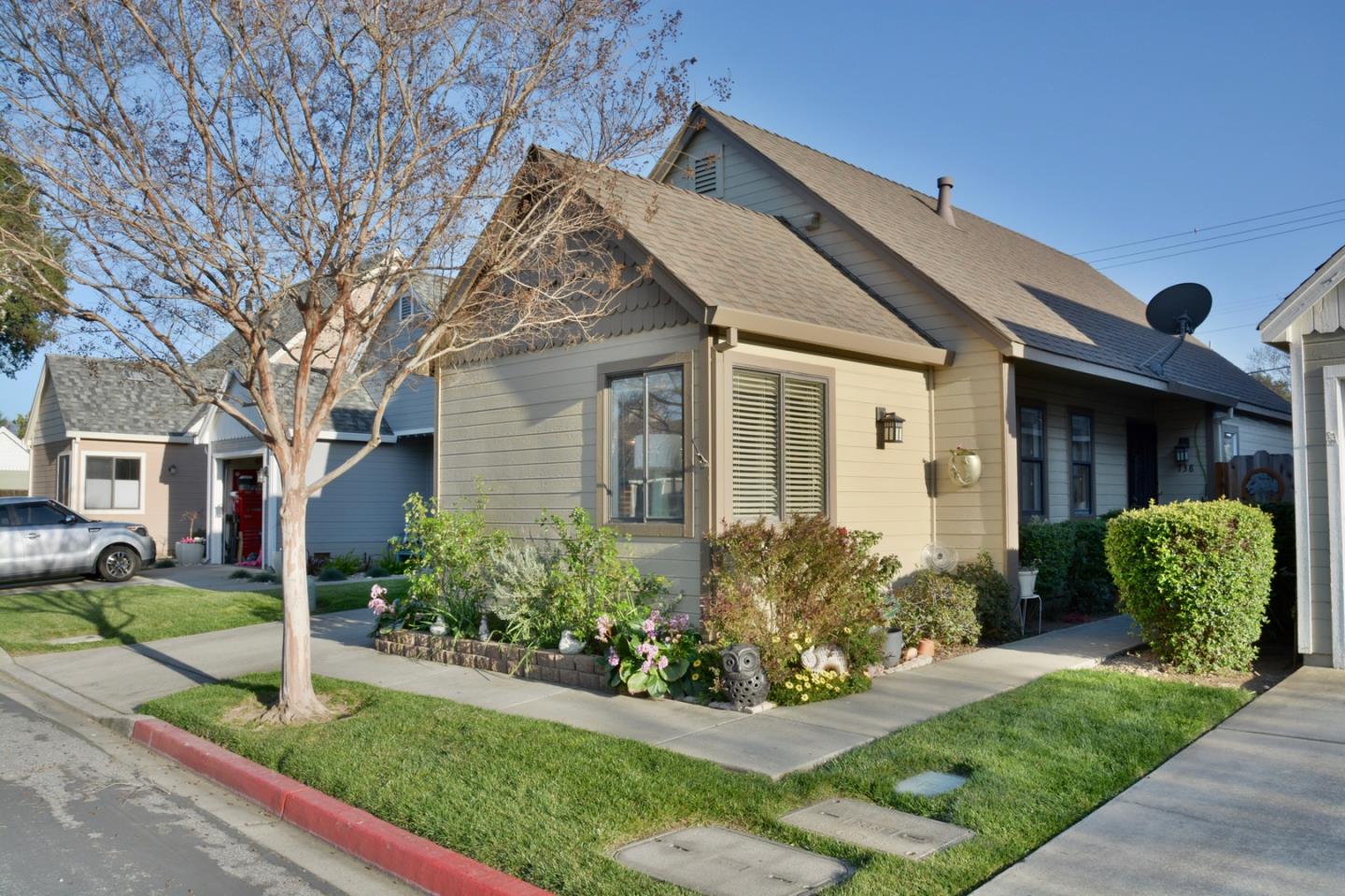 738 Natalie Drive Morgan Hill, CA 95037 - Photo 3 of 37 a front view of a house with garden