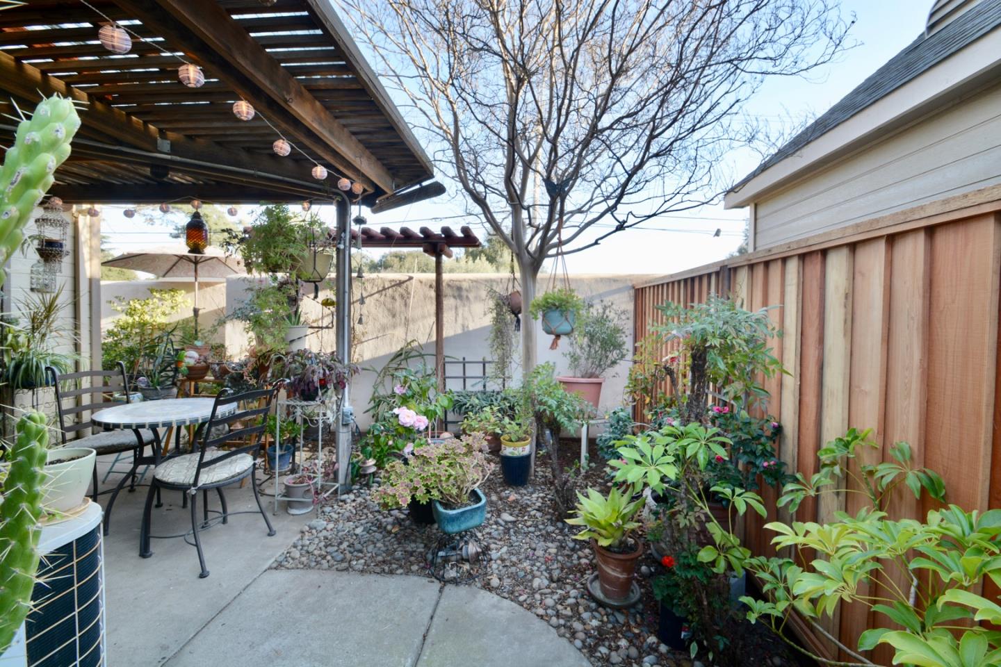 738 Natalie Drive Morgan Hill, CA 95037 - Photo 31 of 37 a view of a chairs and table in backyard