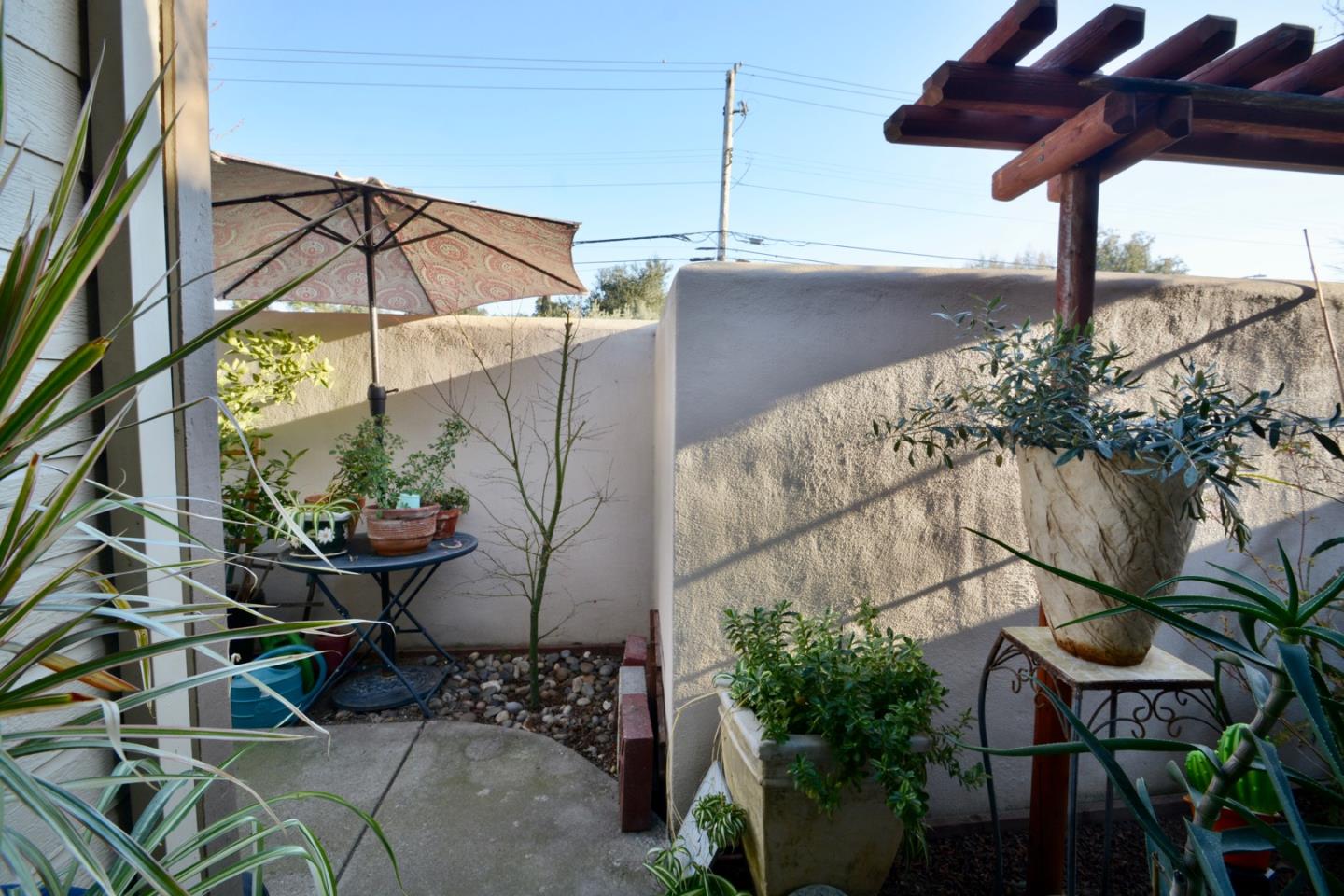 738 Natalie Drive Morgan Hill, CA 95037 - Photo 32 of 37 a view of a chairs and table in the patio