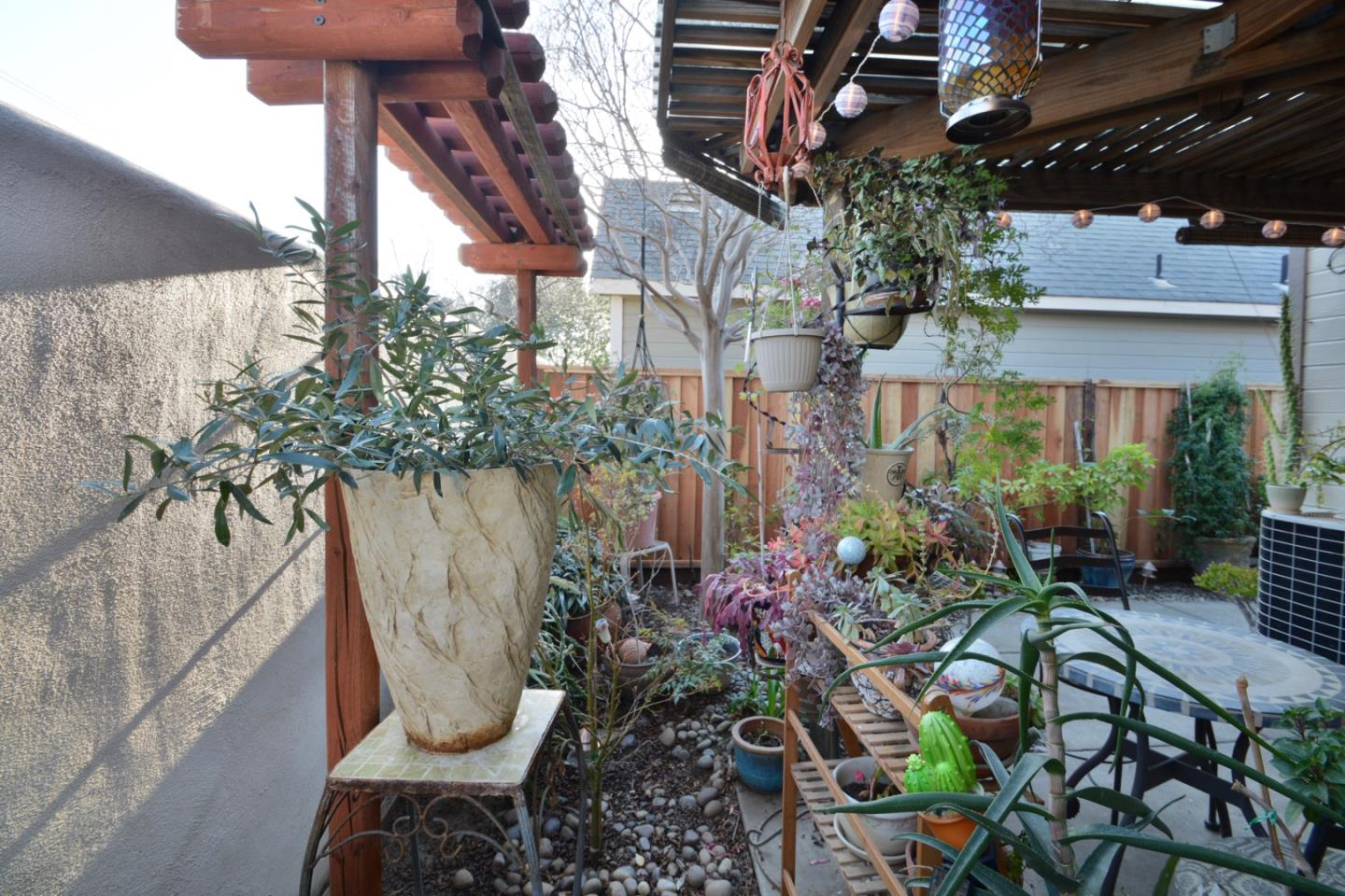 738 Natalie Drive Morgan Hill, CA 95037 - Photo 33 of 37 a view of a chair and table in backyard